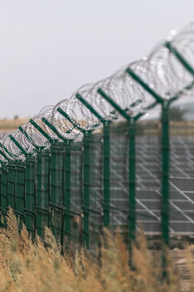 solar-power-station-protected-from-road-by-barbed-2026-01-05-22-59-23-utc (1)